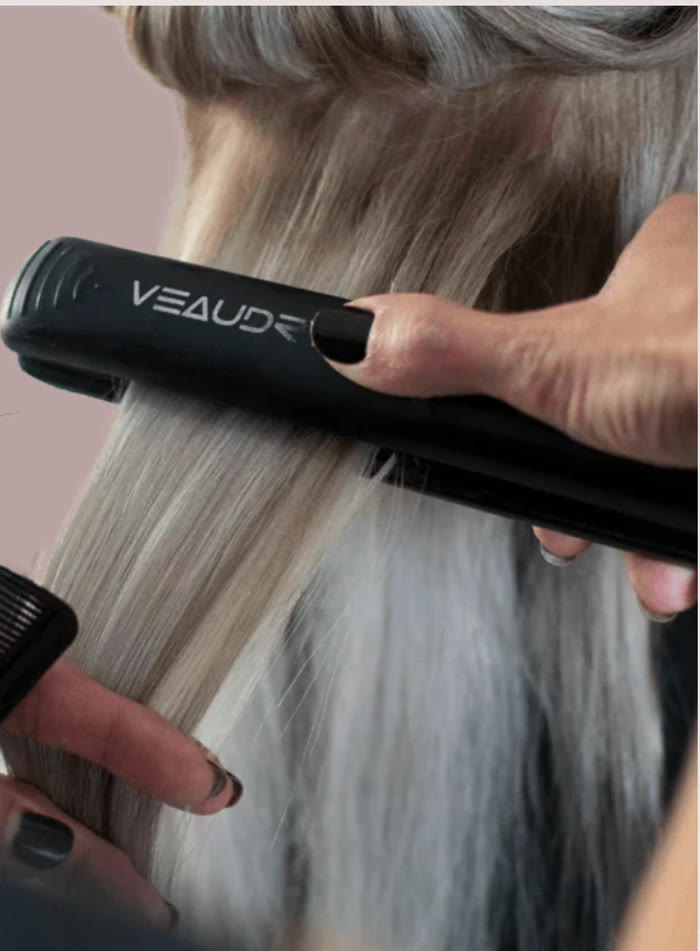 Hair being straightened